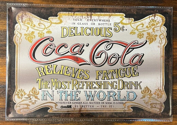 Coca-Cola Relives Fatigue Novelty Metal Sign 12" x 8" NEW! Home & Garden:Home Décor:Plaques & Signs Cozy Home Treasures   