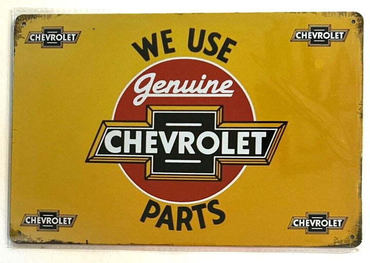 We Use Genuine Chevrolet Parts 8" x 12" Novelty Metal Sign New! Home & Garden:Home Décor:Plaques & Signs Cozy Home Treasures   